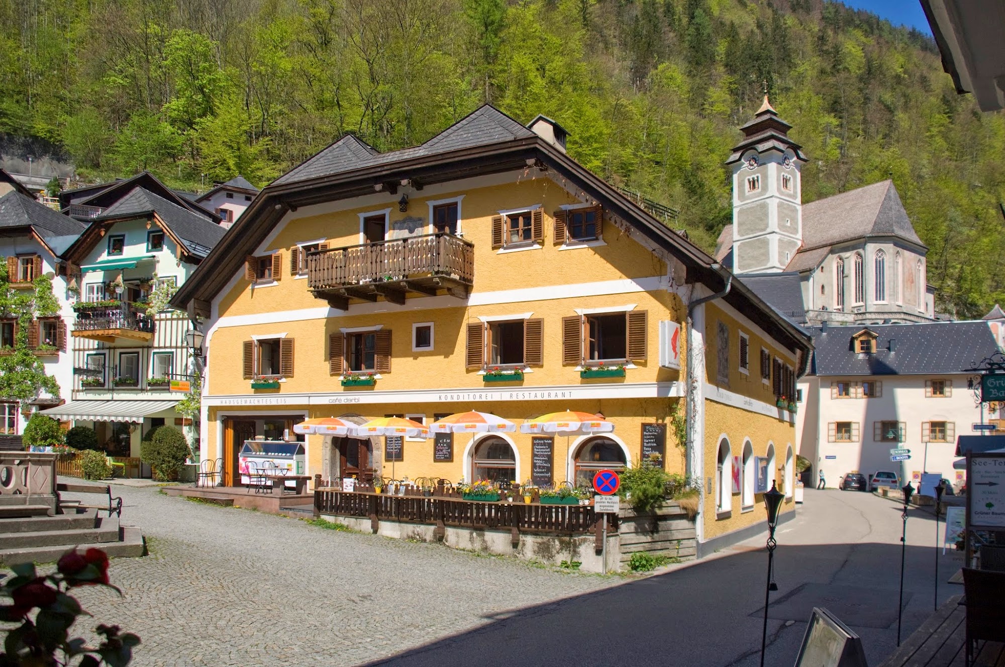 Café Derbl's historic façade facing the market square
